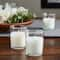 12 Packs: 12 ct. (144 total) White Glass Votive Candles Pack by Ashland&#xAE; Basic Elements&#x2122;